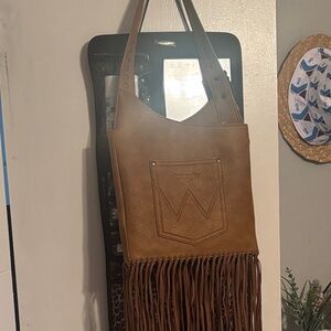 Wrangler shoulder bag with fringe and pocket